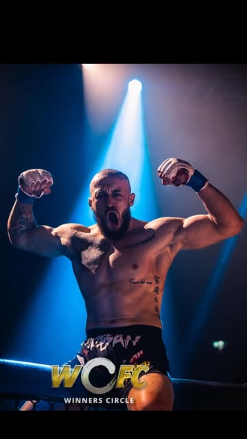 Jayden Hulk Urban flexing in the cage under fight-night lights
